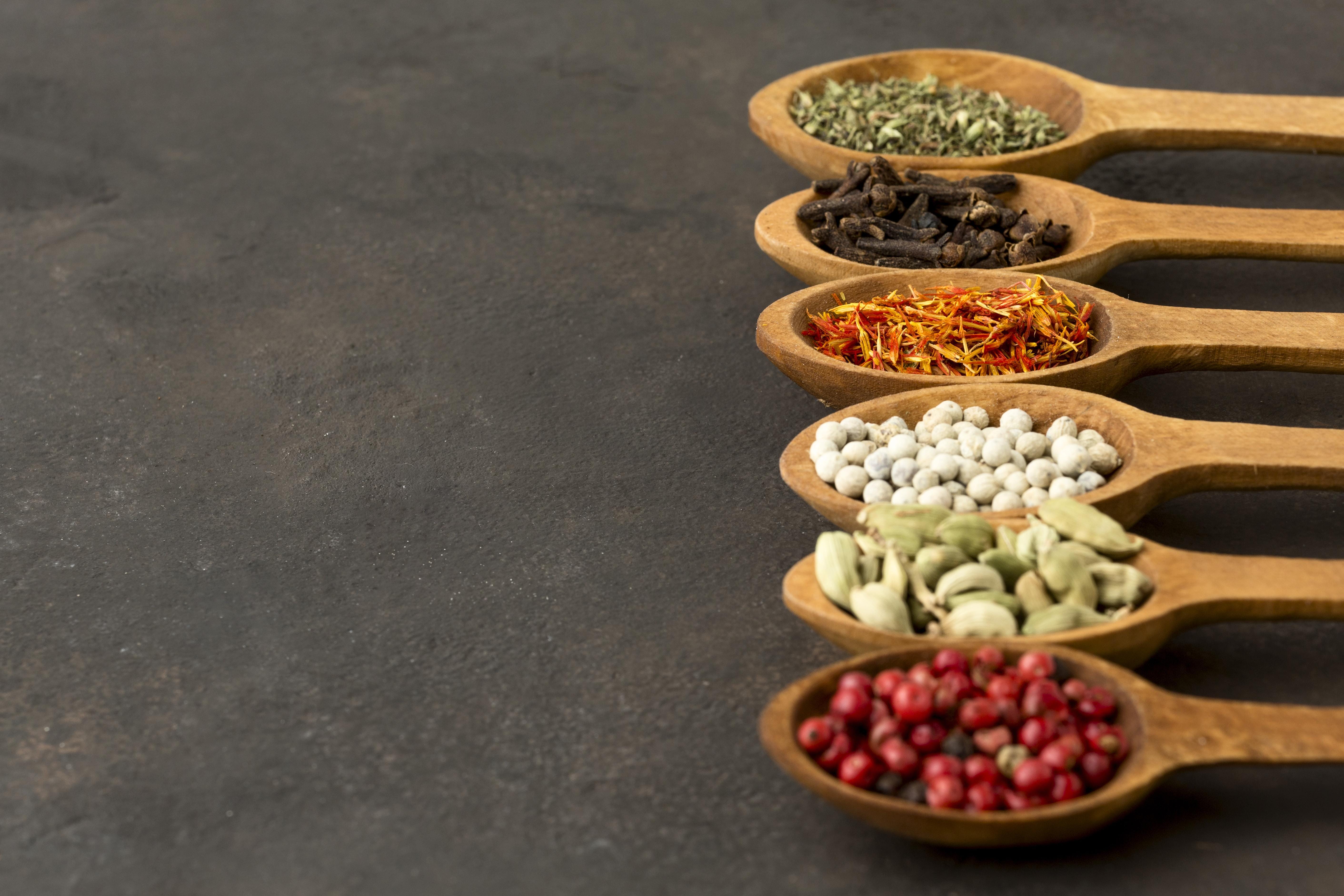 Vibrant array of exotic spices in a rustic bowl